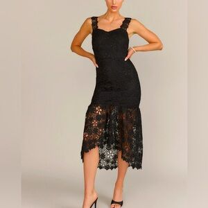 Romantic lace demure little black dress. Sophistication & Sexy.